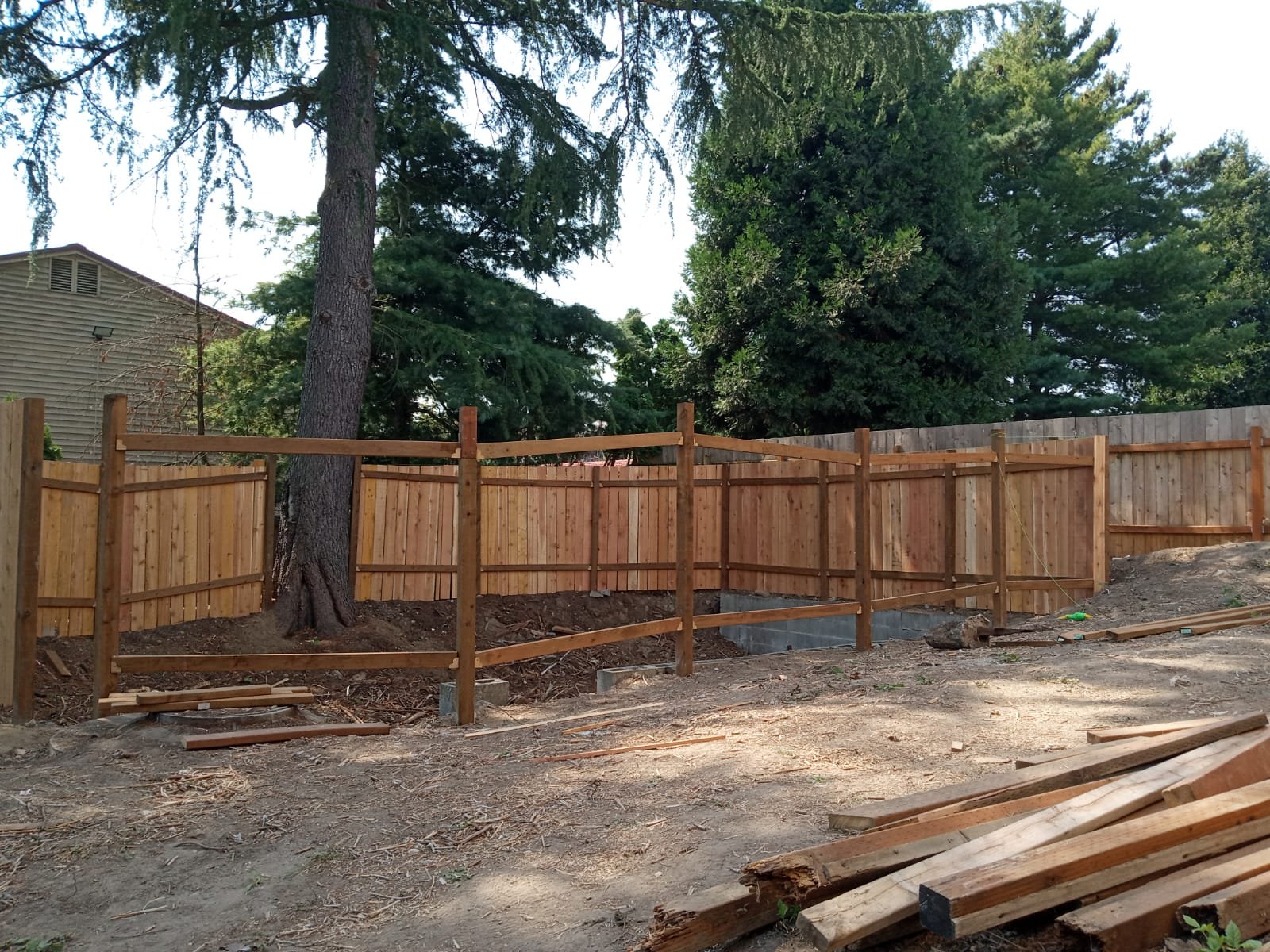 General fence construction services for secure and beautiful outdoor areas